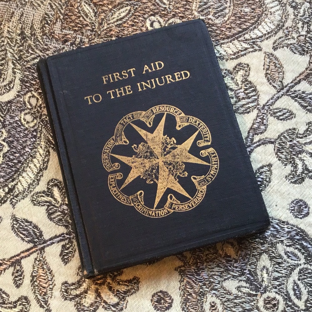 First Aid to the Injured Vintage book Black & Gold 4"x5" hc pocket ref 1934